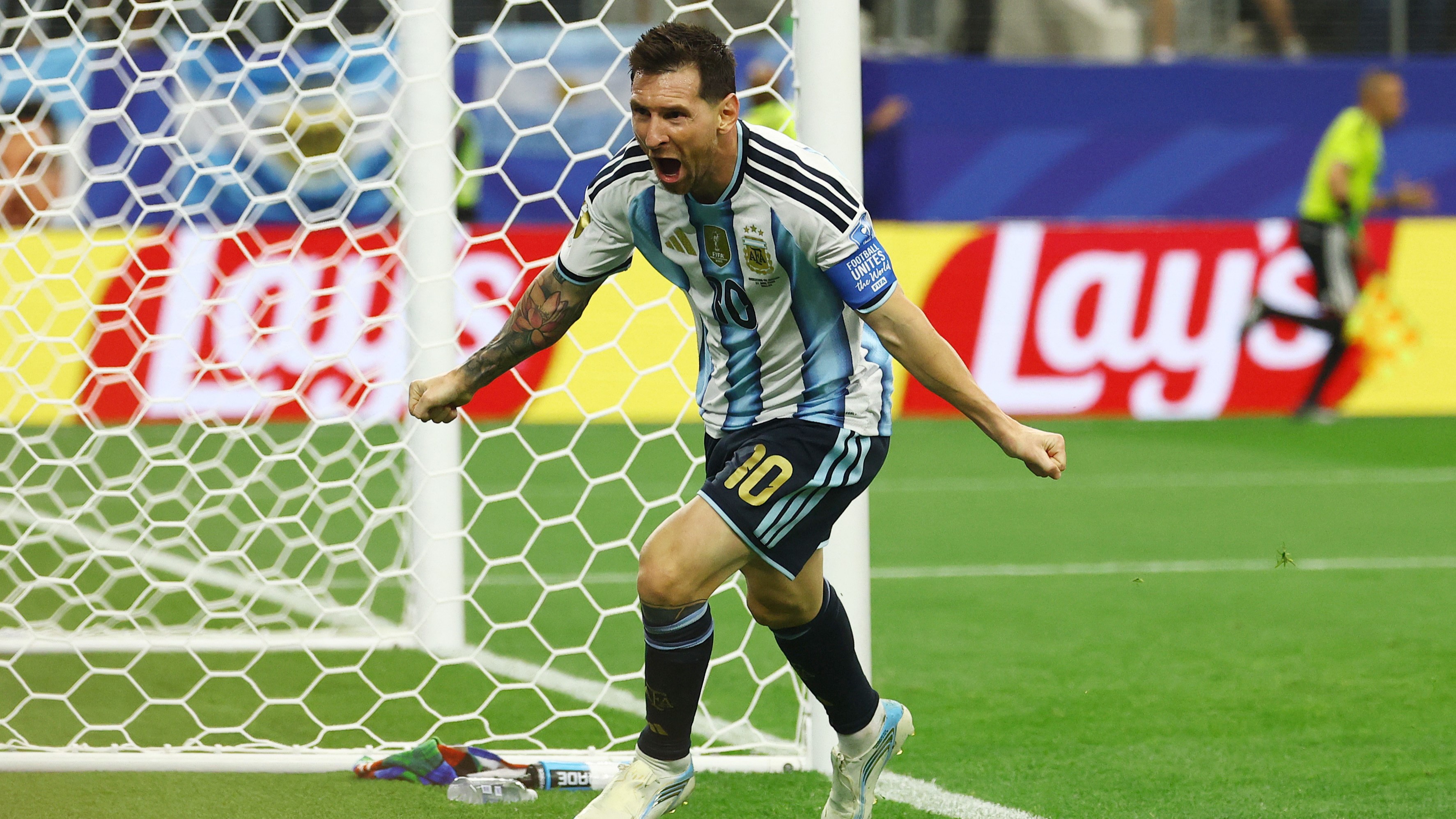 Magical Messi makes World Cup history to send Argentina into last 32