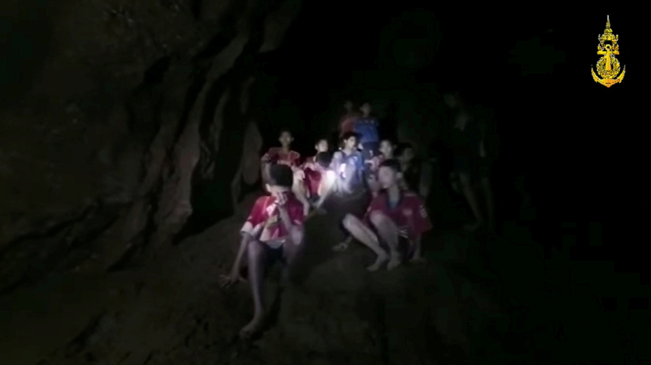 Thai boys still stuck in cave as divers draw up rescue plans