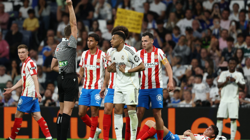 2026-04-10T195315Z_57476932_UP1EM4A1J8PC8_RTRMADP_3_SOCCER-SPAIN-RMA-GIR.JPG