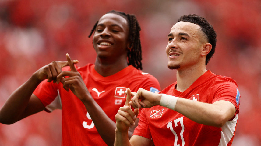 2026-06-24T201345Z_1092111163_UP1EM6O1JXE4W_RTRMADP_3_SOCCER-WORLDCUP-SWI-CAN.JPG