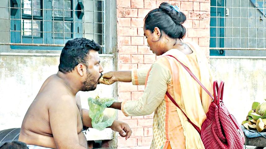 A-woman-feeds.jpg