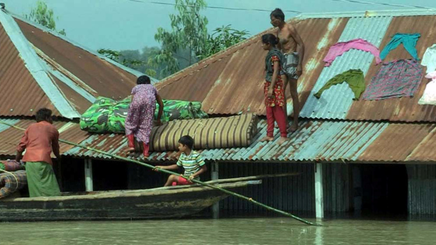 A family of flood-hit Rohodoha village.jpg