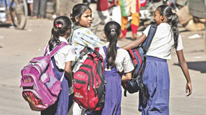 heavy_school_bags_on_delicate_shoulders.jpg