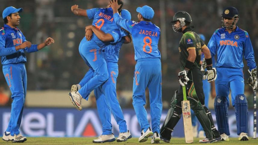 This file photo shows Indian cricketers celebrate fall of Pakistani wicket
