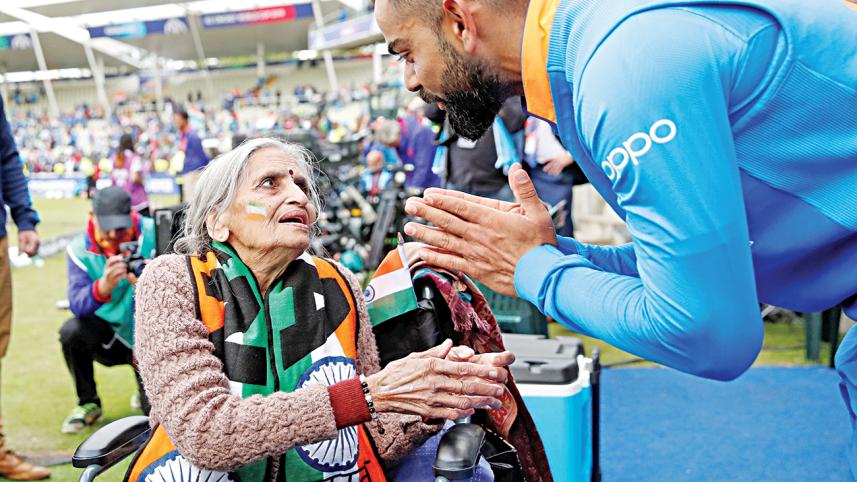 kohli meets fan.jpg