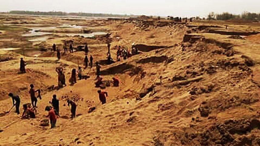 sand-and-stone-lifting-Jadukata-river.jpg