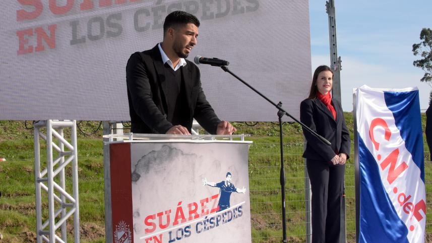 Uruguayan footballer Luis Suarez speaks during the inauguration of a football pitch with his name at Nacional's "Los Cespedes" sports complex in Montevideo.