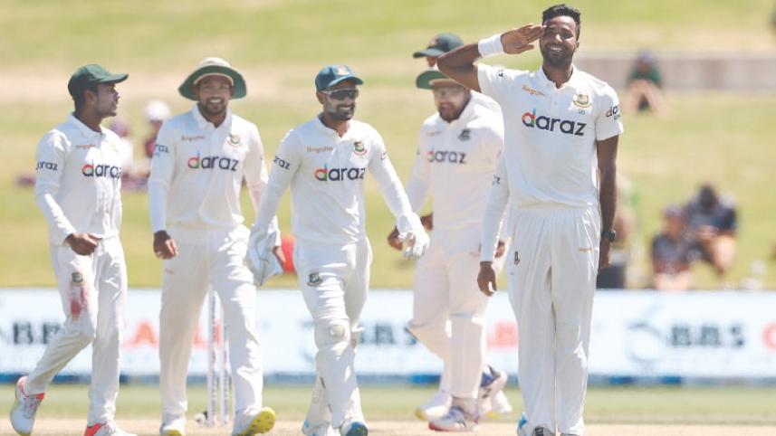 Bangladesh pacer Ebadot Hossain celebrates after dismissing New Zealand’s Devon Conway during the first Test at the Bay Oval