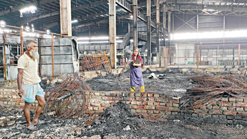 Gazi Tyres, a concern of Gazi Group, saw its production unit in Narayanganj looted, vandalised, and set ablaze in two phases this month, reducing it to a pile of ashes and rubble. Photo: Saurav Hossain Siam