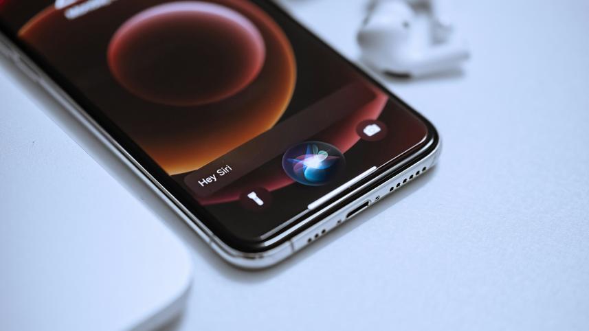 The iOS 18.2 update introduces Visual Intelligence, a tool that allows users to interact with ChatGPT directly through Siri. 