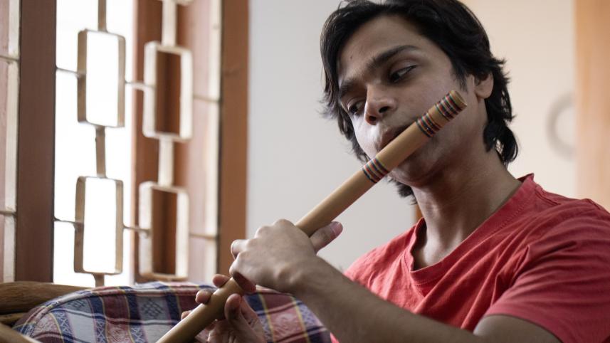Musician playing the flute.