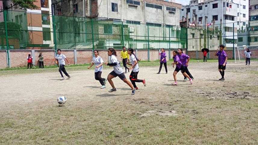 Footballers playing a match