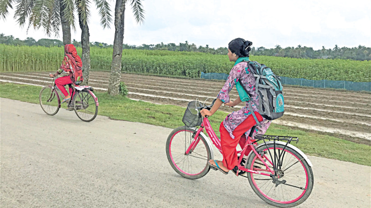 Improved rural roads have transformed local mobility, narrowing the gap between village and city while becoming a key driver of female education. Photo: Adnan Zillur Morshed