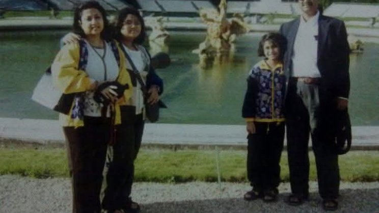 This family photo was taken in Paris, France, in 1998