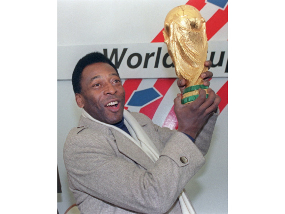Pele with World Cup trophy.jpg
