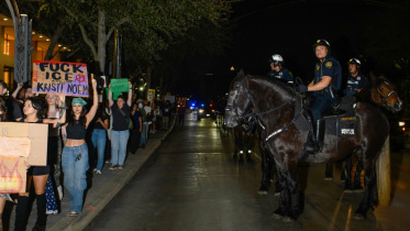AFP__20260109__924H3WK__v1__MidRes__UsImmigrationIceShooting.jpg