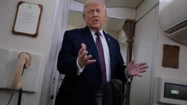 AFP__20260123__2257687936__v5__MidRes__PresidentTrumpReturnsToWashingtonDcFromSwitze.jpg