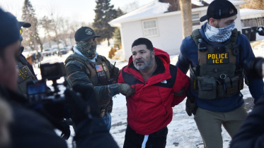 AFP__20260127__948Y96B__v2__MidRes__TopshotUsImmigrationIceShooting.jpg