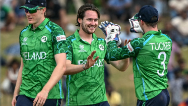 AFP__20260214__97HE9AR__v1__MidRes__CricketIccMensT20Wc2026IrlOma.jpg