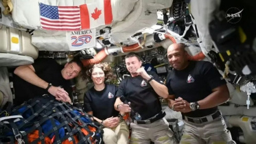 This screengrab from a NASA livestream shows Artemis II crew members Jeremy Hansen, Christina Koch, Reid Wiseman and Victor Glover speaking with US President Donald Trump via a call aboard the Orion spacecraft on April 6, 2026. Photo: AFP