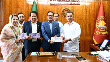 PM unveils commemorative stamp marking FIFA World Cup. Photo: PMO Bangladesh