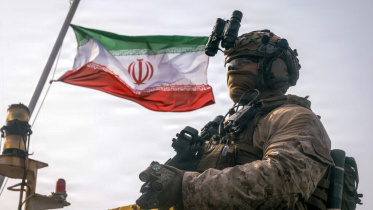 This image provided by the US Marine Corps shows an Iranian flag behind a Marine on July 16, 2026. Photo: AFP