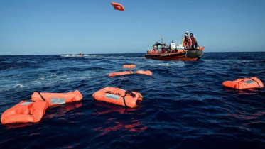 A rescue worker throws life jackets towards migrants at sea. Despite the dangers of crossing the Mediterranean, thousands of Bangladeshis continue to take irregular routes to Europe in search of better opportunities.