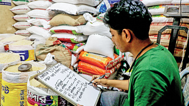 New_Rice_Prices_Written_at_Local_Shop.jpg