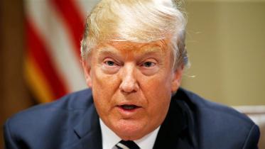 2018-07-23T035905Z_1660360829_RC158B89E270_RTRMADP_3_USA-TRUMP-IRAN.JPG