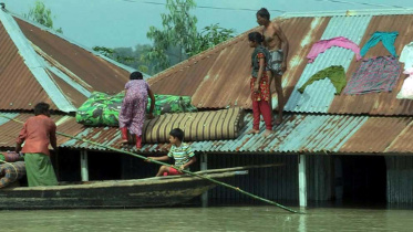 A family of flood-hit Rohodoha village.jpg