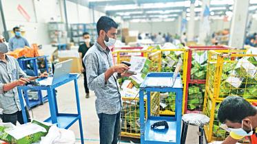 An-employee-scans-barcodes.jpg