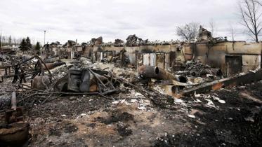 Canada_WEB-fires-Alberta-oil-firms-to-restart-production.jpg