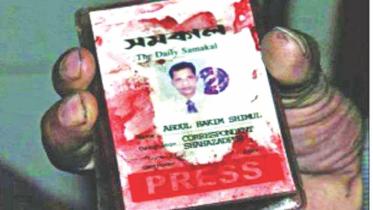 journo dead.jpg