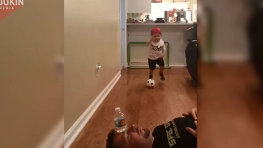 Kid-kick-ball.JPG