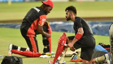 kohli_gayle.jpgns_.jpg