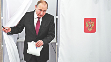 putin voting.jpg
