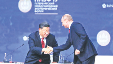 Vladimir Putin with Xi Jinping.jpg