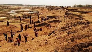 sand-and-stone-lifting-jadukata-river.jpg