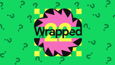 Logo of Spotify Wrapped against a backdrop of question marks