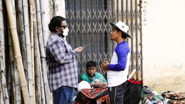 Journalist interviewing a coach/player. 