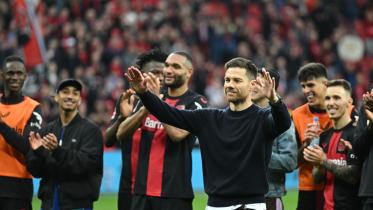 afp_20240330_34mz3ye_v6_preview_topshotfblgerbundesligaleverkusenhoffenheim.jpg