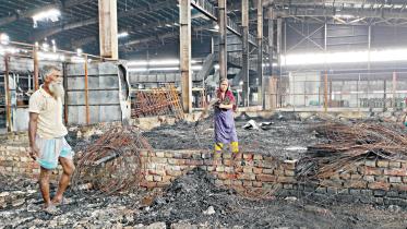 Gazi Tyres, a concern of Gazi Group, saw its production unit in Narayanganj looted, vandalised, and set ablaze in two phases this month, reducing it to a pile of ashes and rubble. Photo: Saurav Hossain Siam