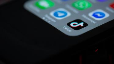 TikTok logo on phone