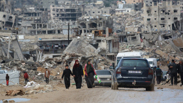displaced_palestinians_walk.jpg