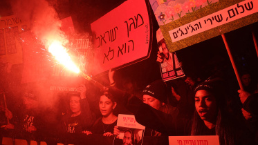 demonstrator_lights_a_flare.jpg