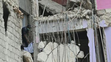 afp_20250706_64wz3t6_v1_midres_pakistanaccidentbuilding.jpg