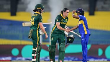 afp_20251017_797r2dt_v1_midres_cricketiccwomenwc2025odisrirsa.jpg