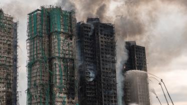 afp_20251127_86bp4zq_v1_midres_hongkongchinafire.jpg