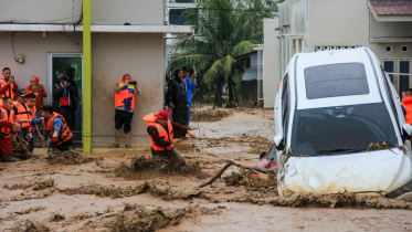afp_20251127_86bn9h8_v2_midres_topshotindonesiaflood.jpg