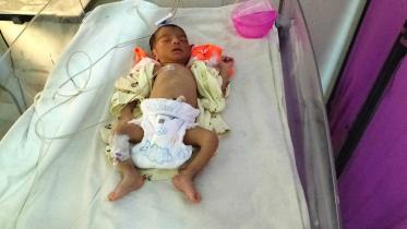 Infant abandoned at Dinajpur Medical College Hospital with note left behind_f69f.jpg